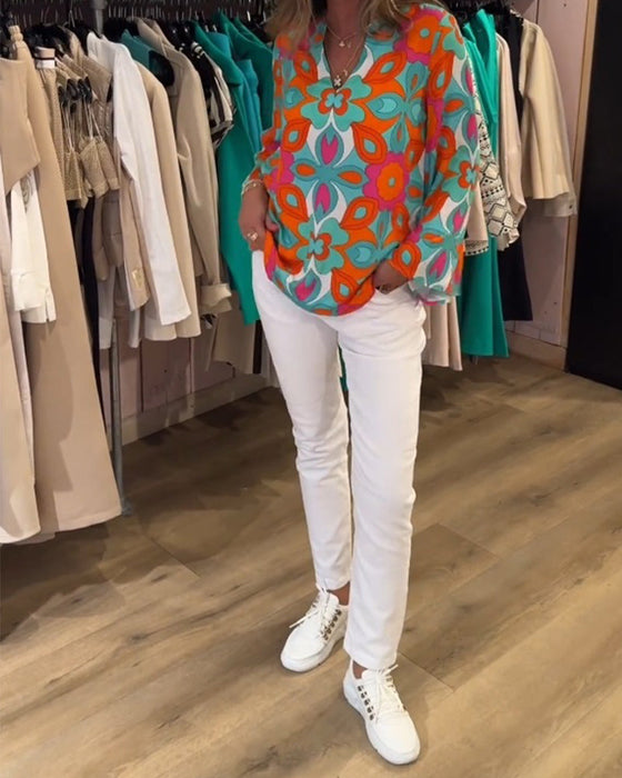 Bluzka o luźnym uniwersalnym fasonie i nadrukach