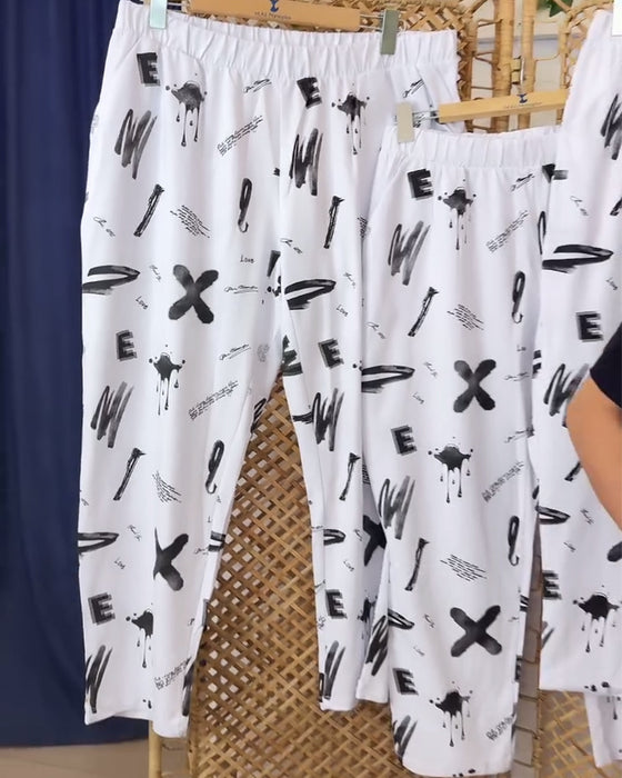 Spodnie z średnim stanem, swobodne, z nadrukiem