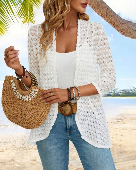 Elegancki sweterek koronkowy