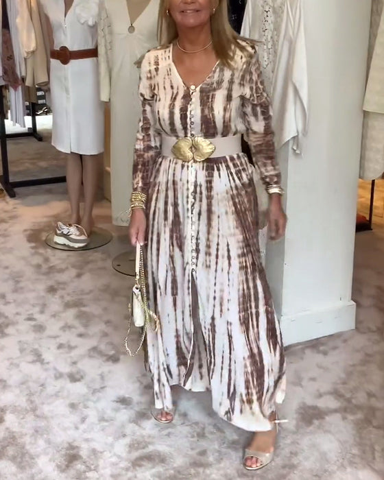 Sukienka z rozcięciem w talii długim rękawem i dekoltem w kształcie litery V