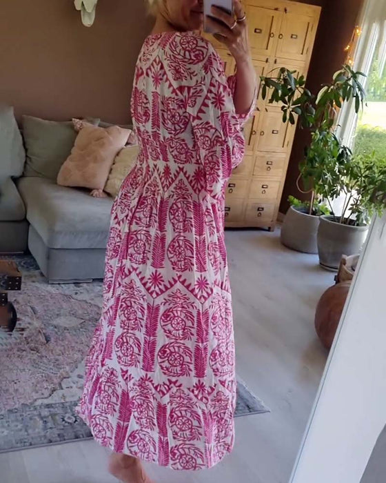 Elegancka sukienka z nadrukiem w kształcie litery V i rękawami typu dzwonek