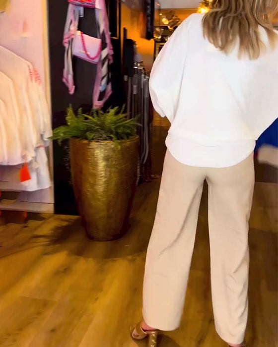 Wiązana bluzka z dekoltem w szpic