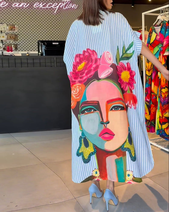 Bluzka z guzikamii rozcięciem w pionowe paski