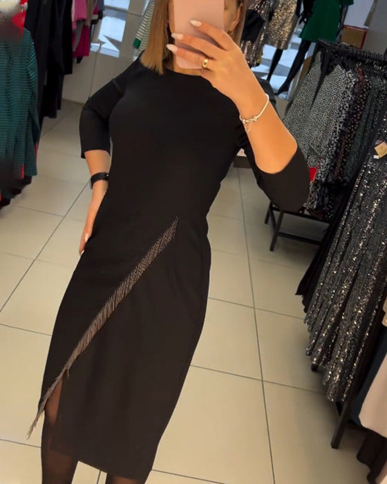 Rozcięta sukienka z okrągłym dekoltem