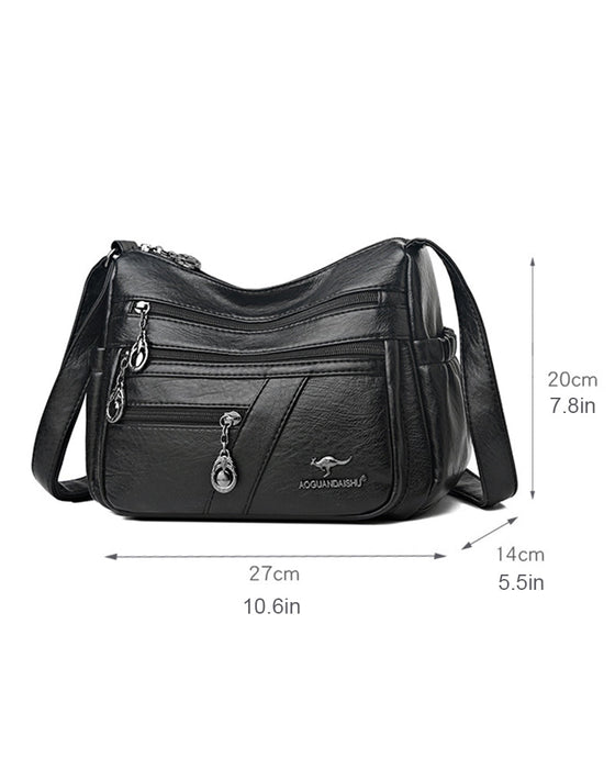 Wielokieszeniowa miękka skórzana torebka na ramię (crossbody)