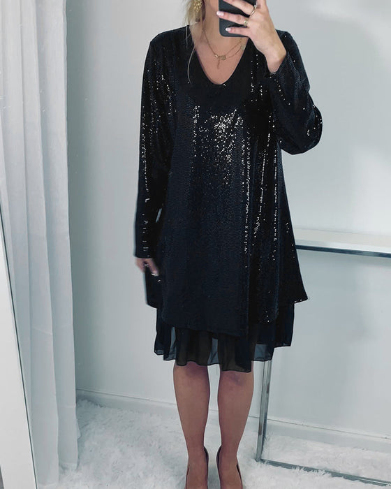 Elegancka luźna sukienka z długim rękawem