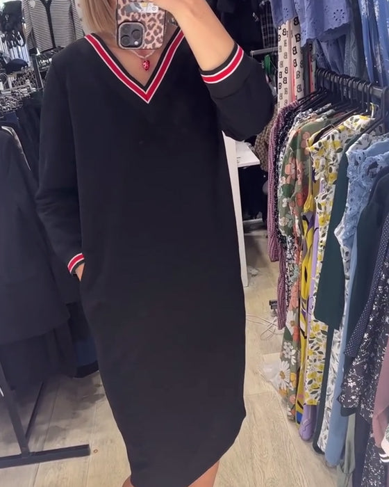 Sukienka z dekoltem w kształcie litery V i z kieszeniami