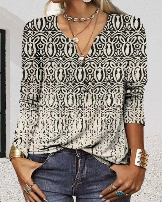 Top z długim rękawem z dekoltem w szpic i nadrukiem