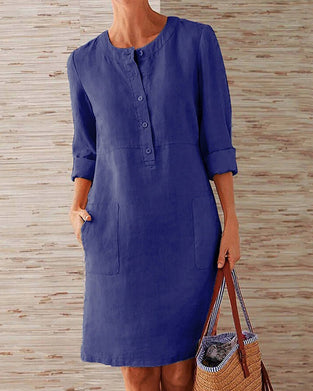 Jednolita sukienka do kolan z okrągłym dekoltem