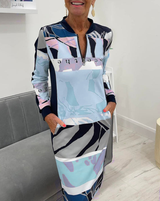 Sukienka z długim rękawem i kieszenią zapinana na suwak w bloki kolorów