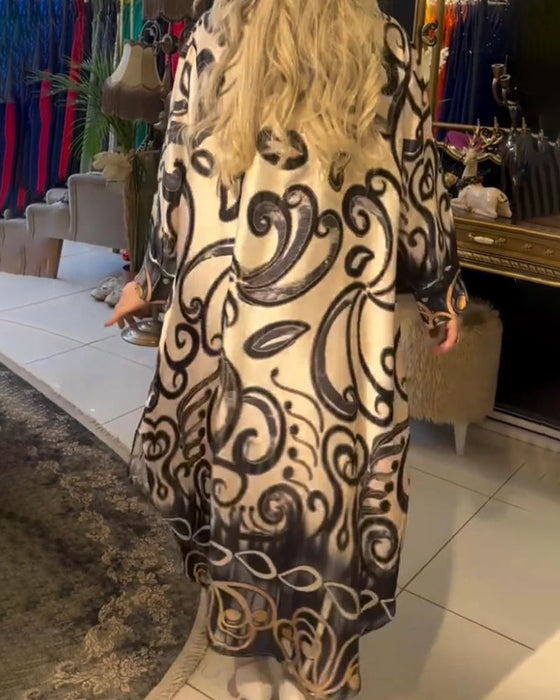 Luźna i elegancka sukienka z nadrukiem