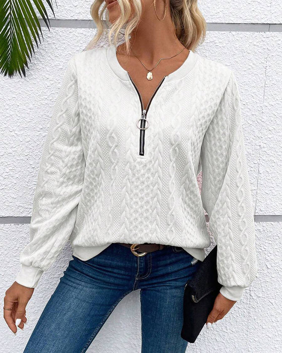 Luźna jednokolorowa bluza z długim rękawem i zamkiem błyskawicznym