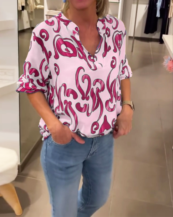 Elegancka bluzka z długim rękawem i dekoltem w kształcie litery V