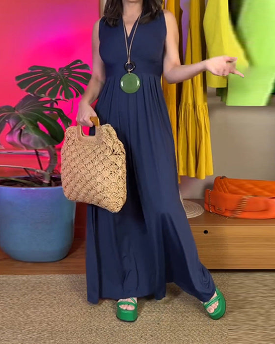 Elegancka, dopasowana, długa sukienka bez rękawów