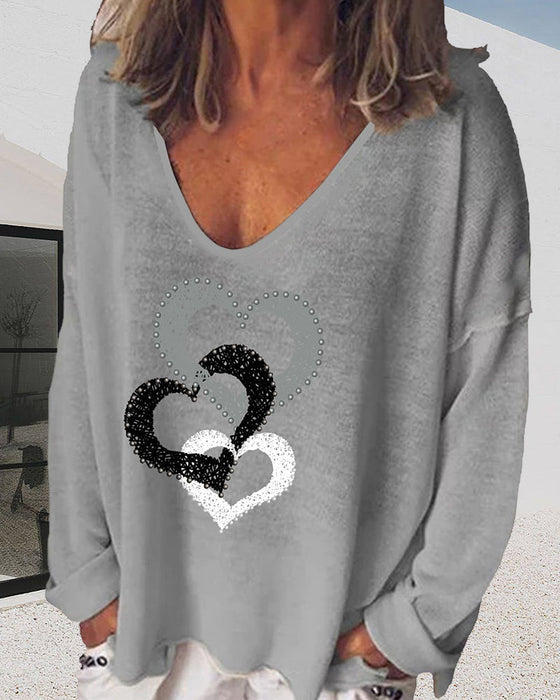 Bluzka z długim rękawem i nadrukiem serca