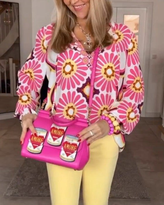 Bluzka z geometrycznym nadrukiem i długim rękawem