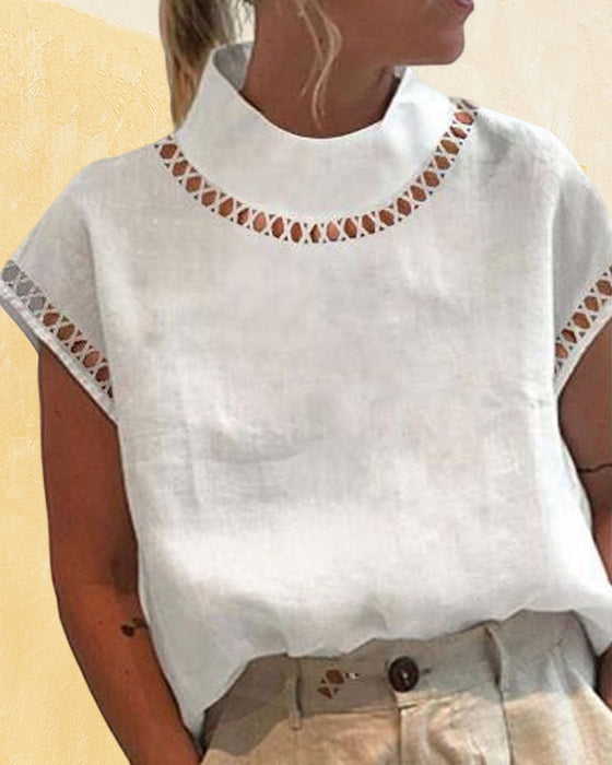 Bluzka ze stójką z koronki w jednolitym kolorze