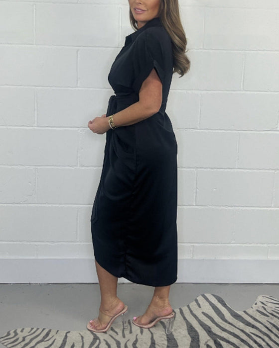 Elegancka plisowana sukienka z dekoltem