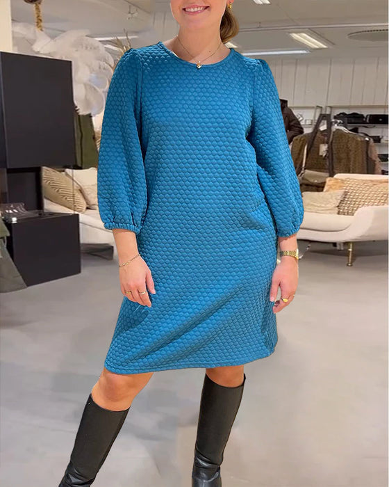 Elegancka sukienka w jednolitym kolorze