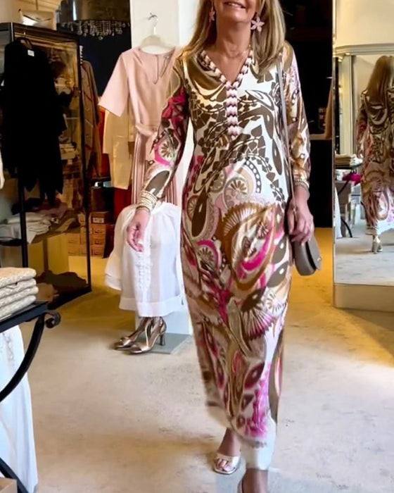 Długa sukienka z dekoltem w kształcie litery V z nadrukiem