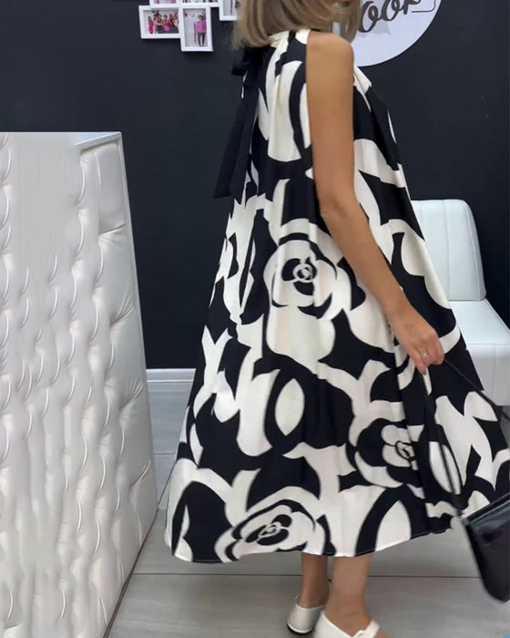 Elegancka sukienka bez rękawów z nadrukiem