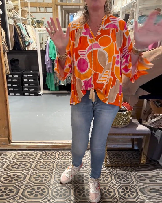 Bluzka kolorowa z szerokim ramieniem