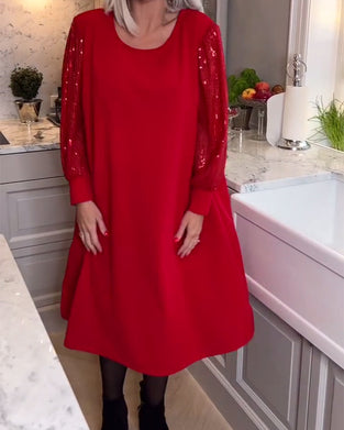 Modna jednokolorowa sukienka z cekinami