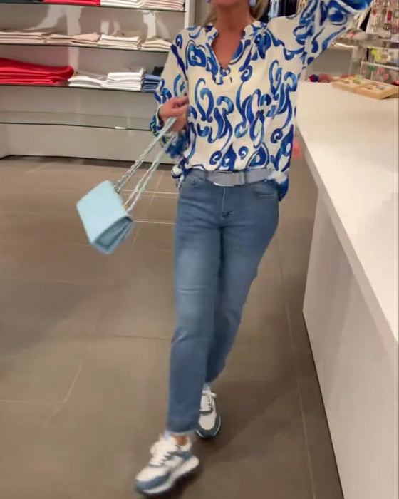 Elegancka bluzka z długim rękawem i dekoltem w kształcie litery V