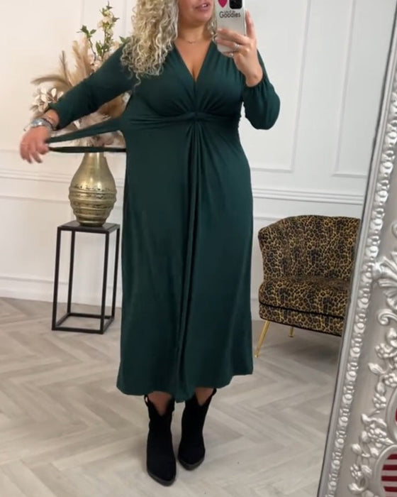 Seksowna sukienka jednokolorowa z długim rękawem
