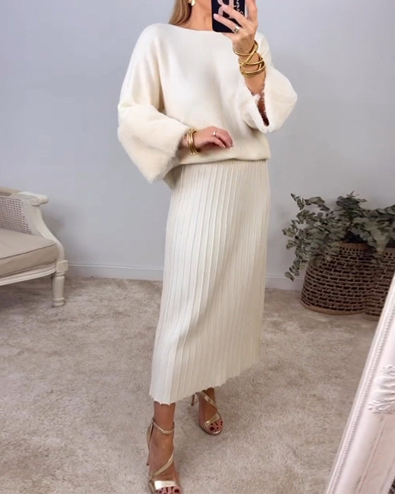 Elegancki jednokolorowy sweter z długim rękawem