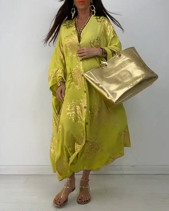 Sukienka z długim rękawem zapinana na guziki