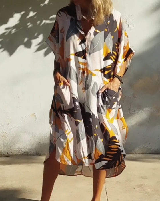 Sukienka z kieszeniami i nadrukiem liści