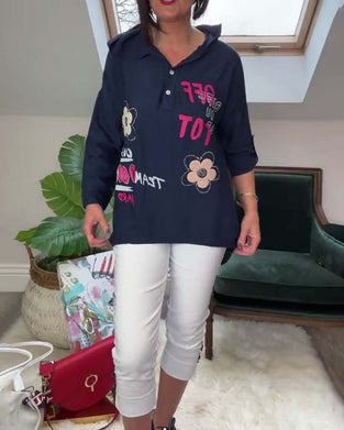 Luźna bluza z długim rękawem i haftowanym kwiatowym napisem