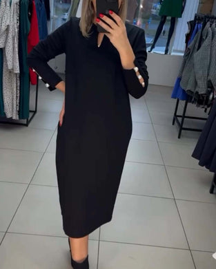 Elegancka sukienka zapinana na perłowe guziki