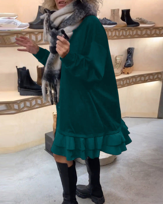 Sukienka o eleganckiej sylwetce i długim rękawie