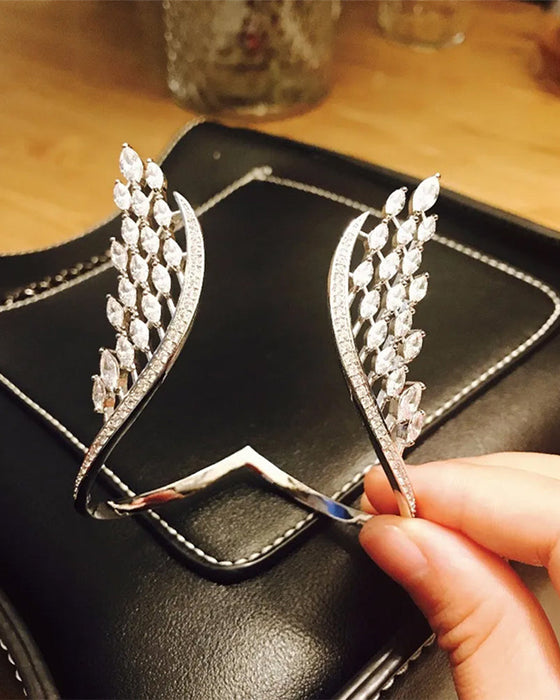 Pierścionek i bransoletka ze skrzydłami anioła