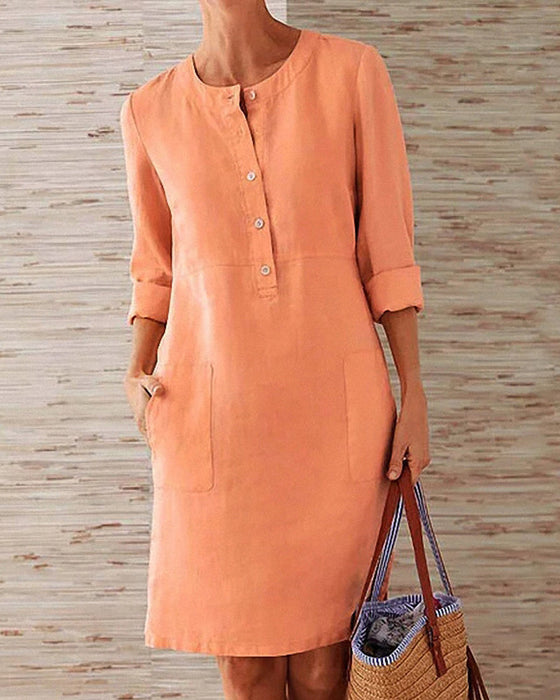 Jednolita sukienka do kolan z okrągłym dekoltem