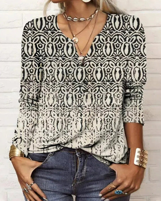 Top z długim rękawem z dekoltem w szpic i nadrukiem