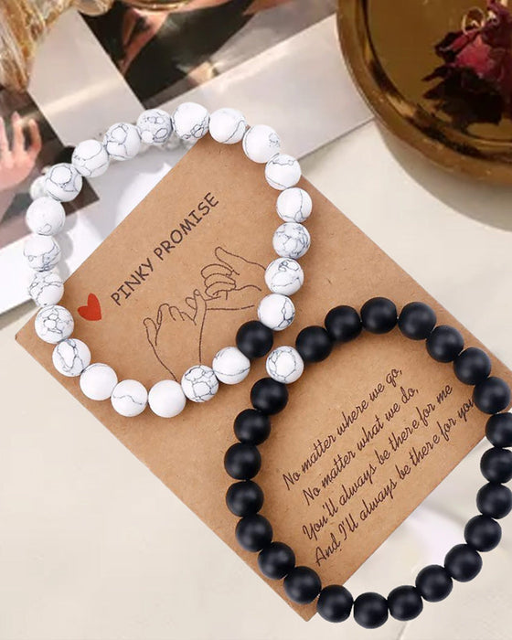 Zestaw bransoletek dla par z czarno-białych koralików