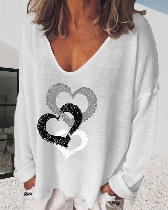 Bluzka z długim rękawem i nadrukiem serca