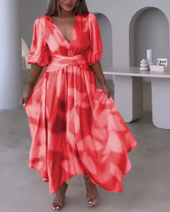 Elegancka sukienka z głębokim dekoltem w kształcie litery V z nadrukiem