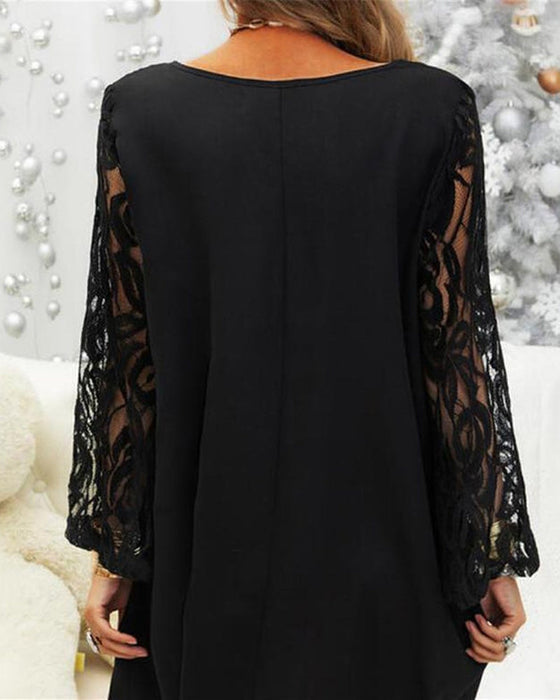 Elegancka czarna sukienka z koronkowymi rękawami