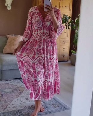 Elegancka sukienka z nadrukiem w kształcie litery V i rękawami typu dzwonek