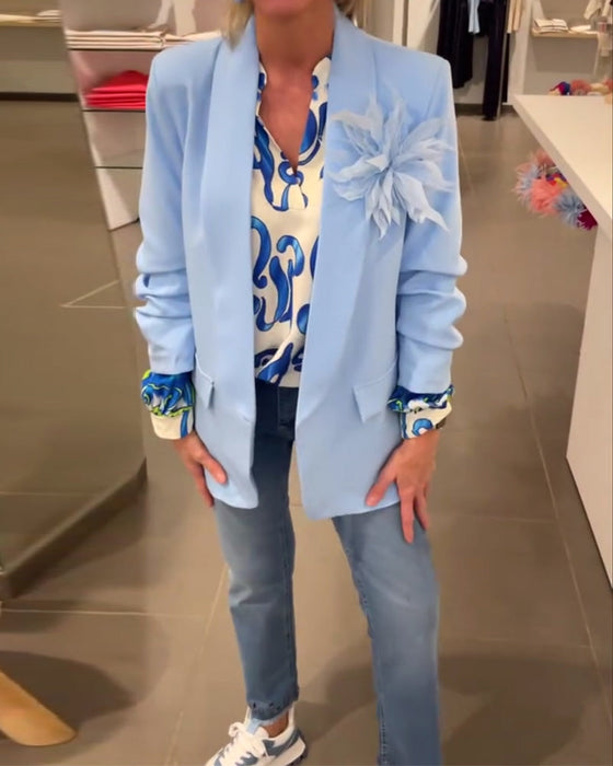 Elegancka bluzka z długim rękawem i dekoltem w kształcie litery V