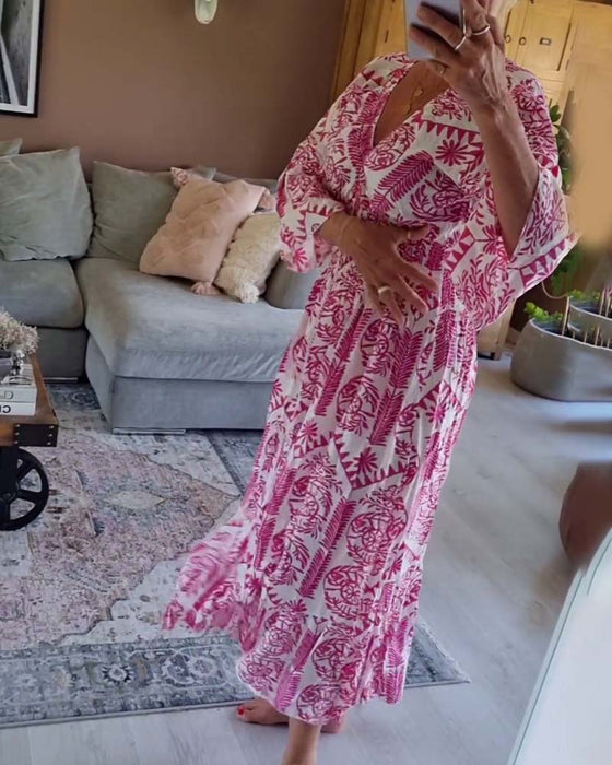 Elegancka sukienka z nadrukiem w kształcie litery V i rękawami typu dzwonek