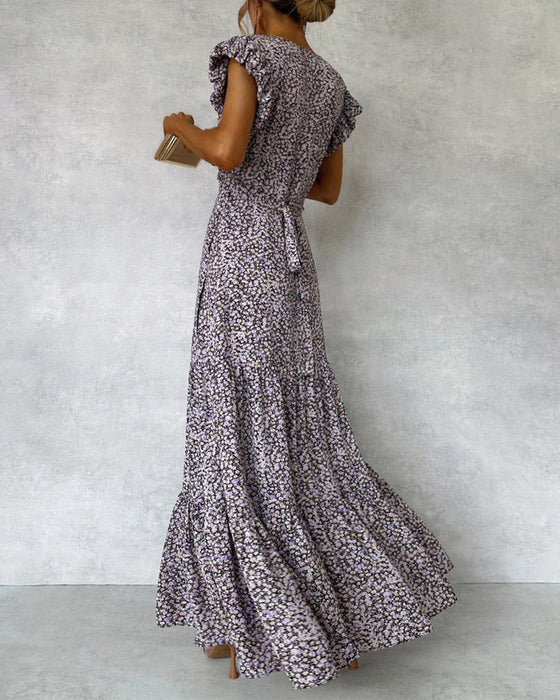 Elegancka sukienka z marszczonymi rękawami i rozcięciem