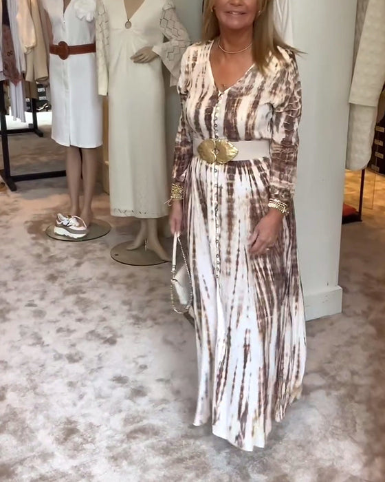 Sukienka z rozcięciem w talii długim rękawem i dekoltem w kształcie litery V