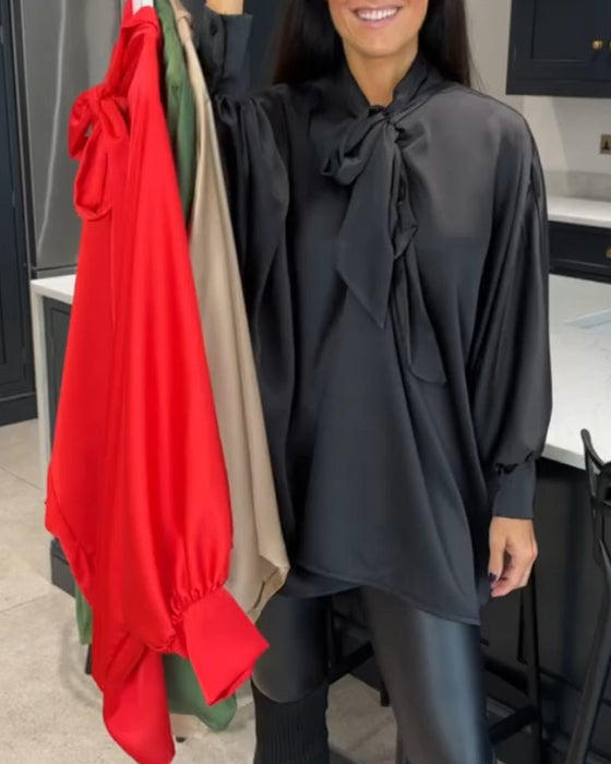 Bluzka w jednolitym kolorze z kokardą