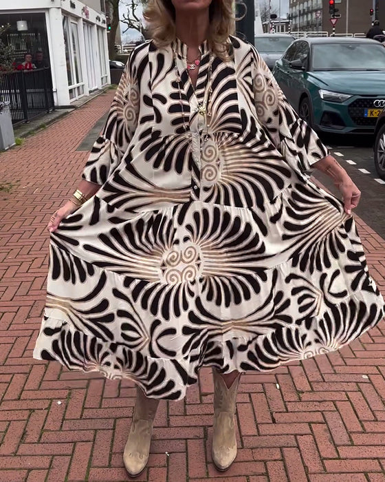 Sukienka z dekoltem w kształcie litery V i rozszerzanymi rękawami