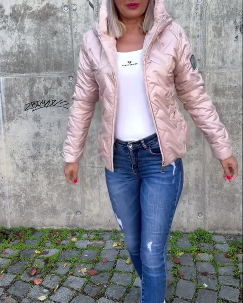 Swobodna jednokolorowa pikowana kurtka z kapturem i zamkiem błyskawicznym